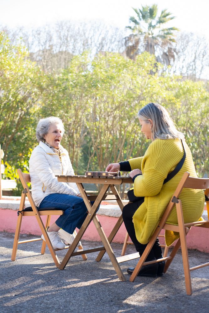 Greater Love and Care caregiver with a senior client
